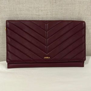 Furla women’s eggplant clutch